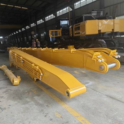 Een graafmachine met armstapel, een boemer met kerncomponenten en een lager